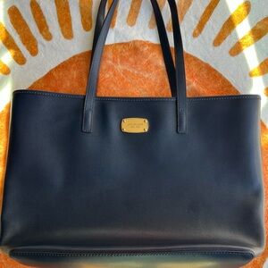 Michael Kors Navy Handbag with padded laptop with zipper closure